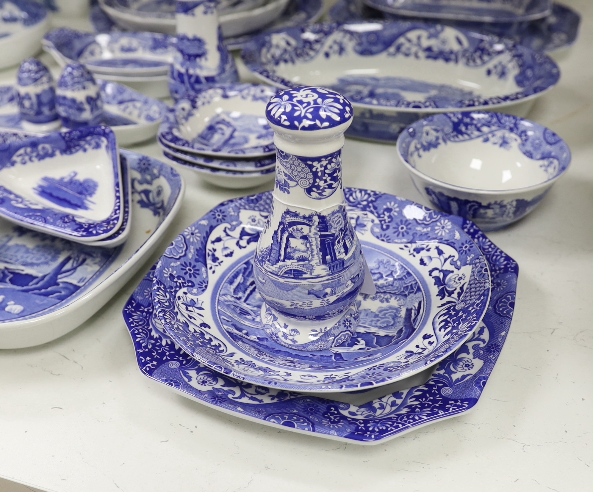 A collection of Spode Italian blue and white various sized serving dishes, cruets etc
